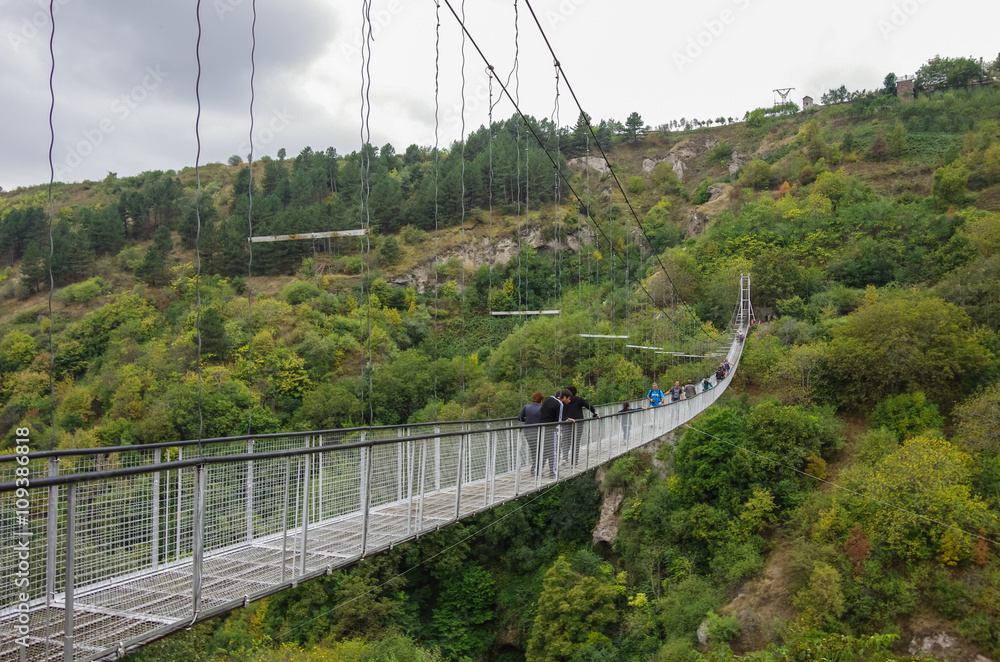 Obraz premium Khndzoresk Swinging Bridge. Suspension bridge over the gorge near Goris village. Armenia