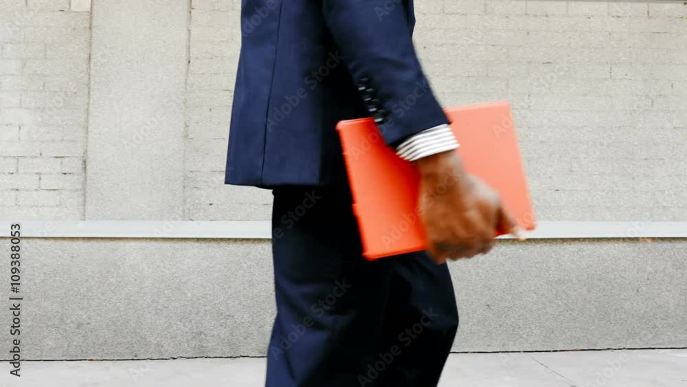 African American businessman walk with tablet outdoors African American businessman walk with tablet outdoors