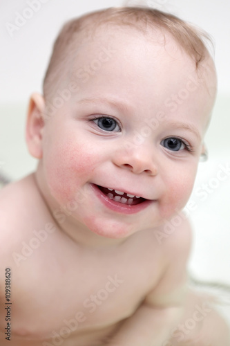 Smiling boy in bathroom