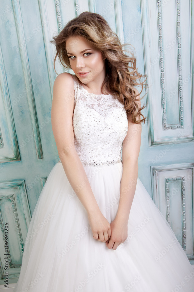 Beauty woman with wedding hairstyle and makeup. Bride fashion. Beauty woman with wedding hairstyle and makeup. Bride fashion.