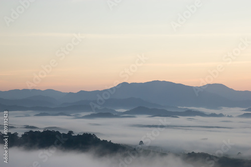 The sun rises in the mist at Khao Kai Nui  Phangnga Thailand