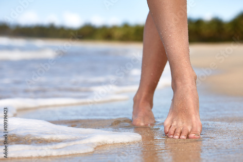 Woman walking on a beach