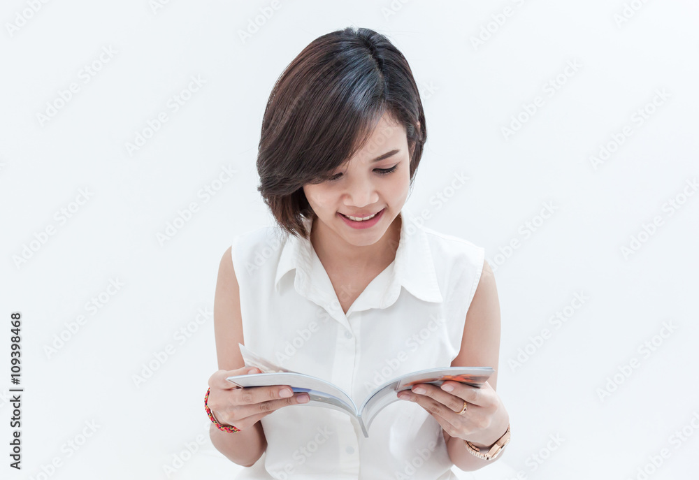 Asian woman reading a book Asian woman reading a book