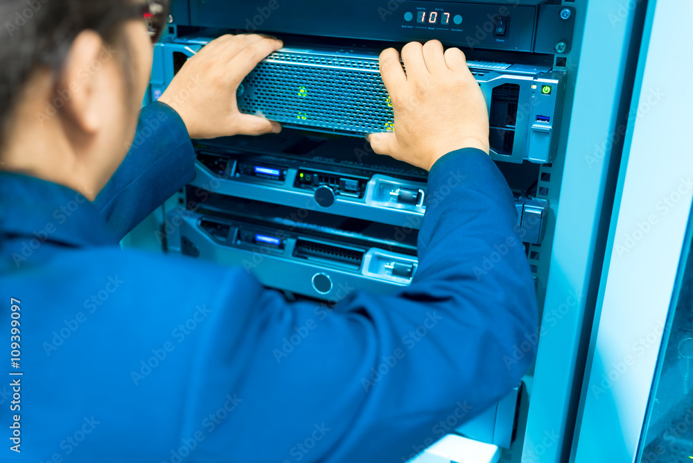 Man fix server network in data center room