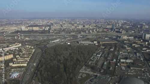Wallpaper Mural Aerial view from helicopter fly above megapolis. Height. New skyscrapers, green park, roads. Sunny day. Transportation.  Torontodigital.ca
