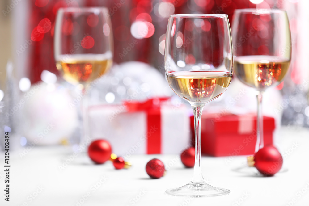 Wineglasses on red blurred lights background Wineglasses on red blurred lights background