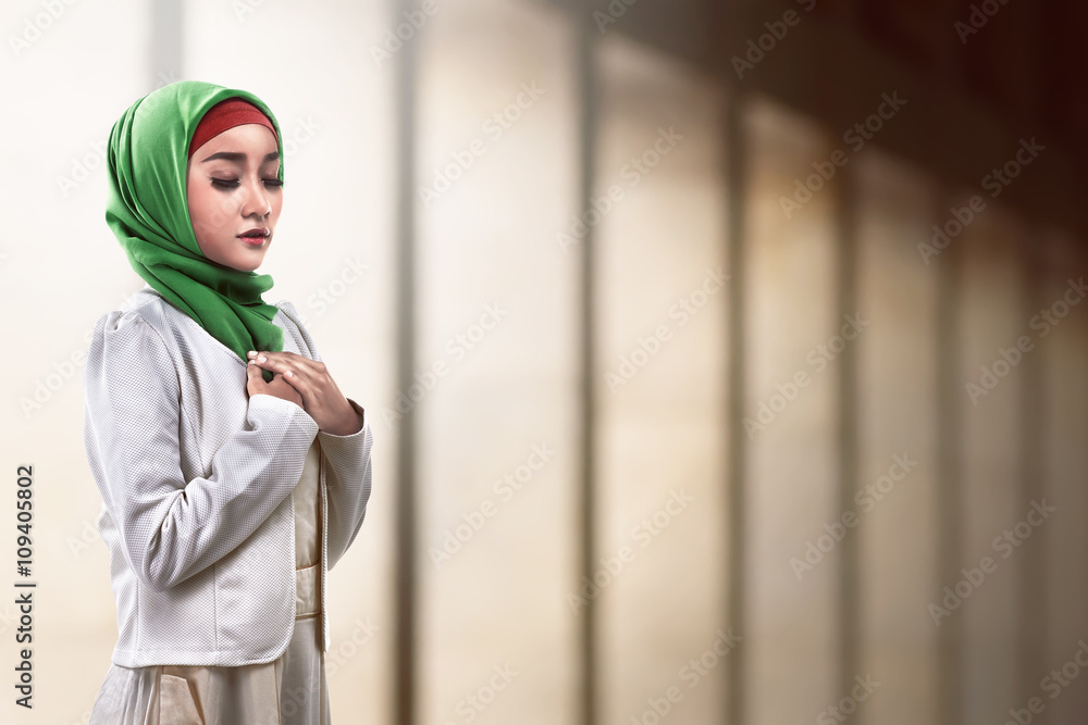 Asian muslim woman praying