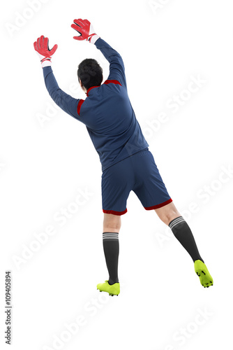 Back view of goalkeeper catch ball