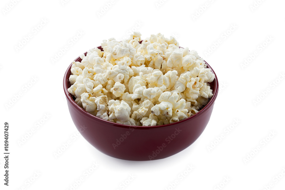 red bowl with buttered popcorn red bowl with buttered popcorn