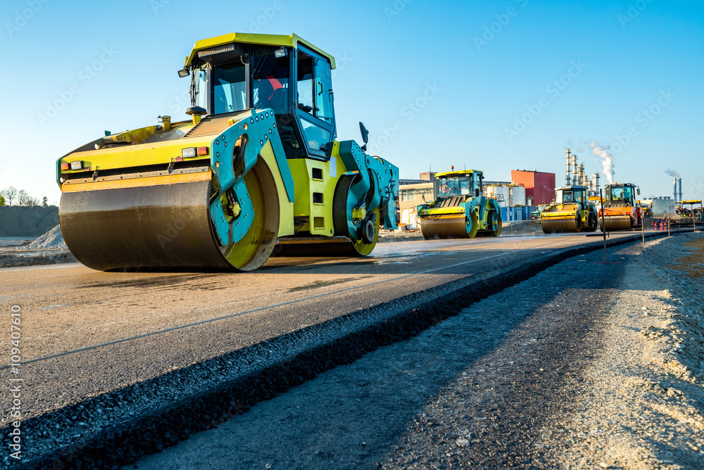 Road rollers working on the construction site Road rollers working on the construction site
