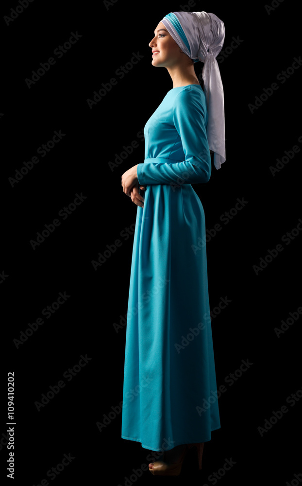 Young muslim woman in blue dress