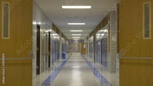 Rack focus shot of an empty school hallway