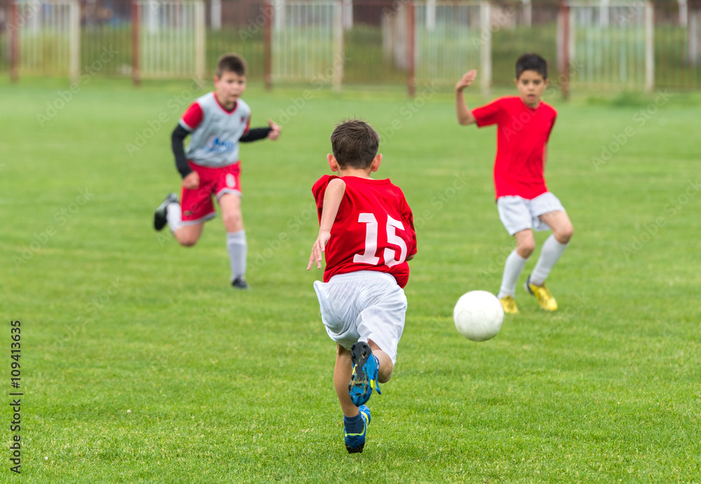  Boys kicking ball