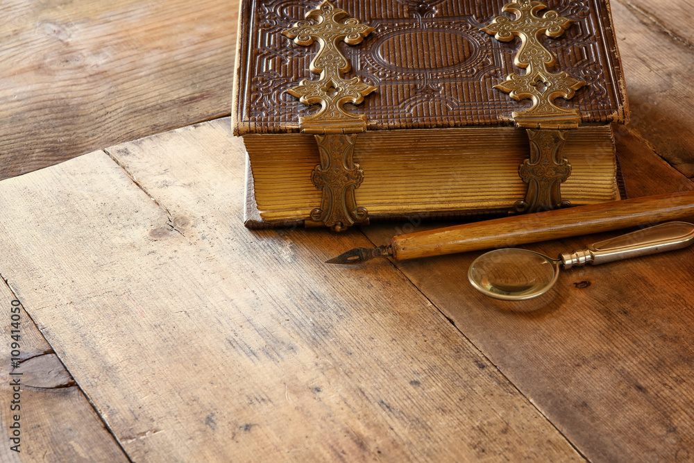 Obraz premium top view of antique book cover, with brass clasps