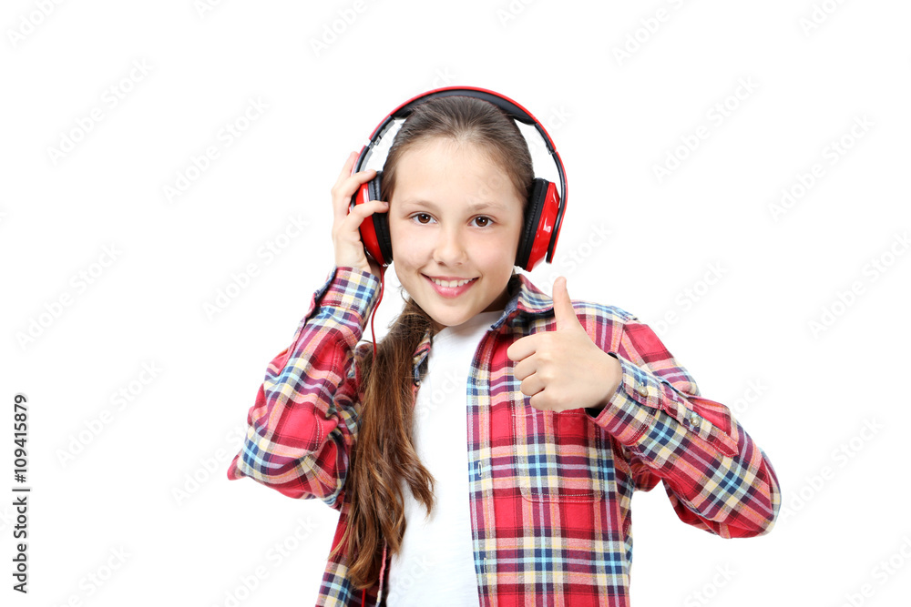 Portrait of young girl with headphones isolated on a white Portrait of young girl with headphones isolated on a white