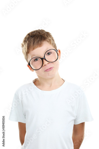 Portrait of happy little boy with eyeglasses on white background