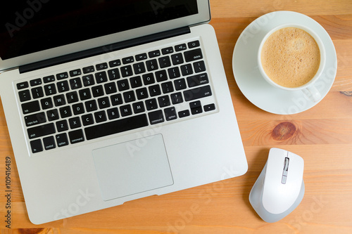 Laptop on wood table