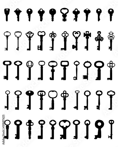Set of black silhouettes of door keys, vector