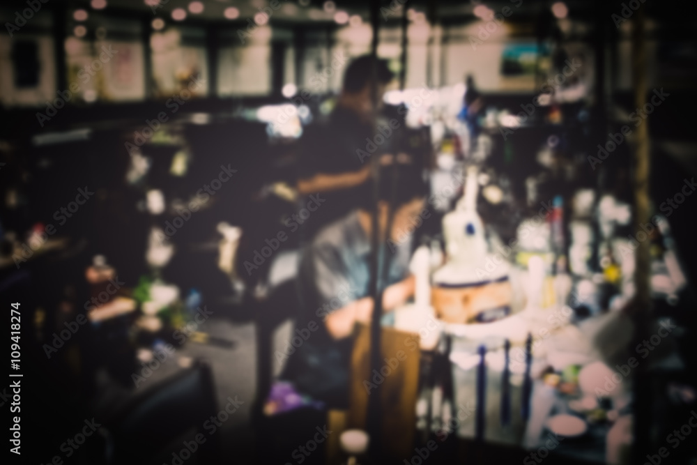 Obraz premium Jewelry factory with blurred workers background