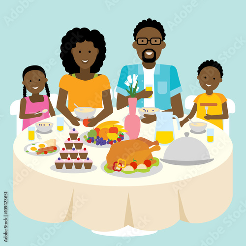 Happy african american family dinner table. Thanksgiving celebration. Cake and turkey. Holiday togetherness.