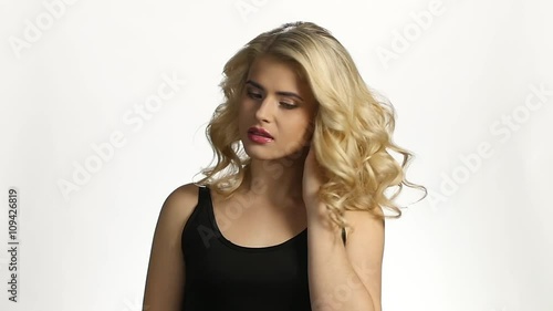 Wallpaper Mural Girl with long blond hair. Beautiful hair curls. White. Slow motion Torontodigital.ca