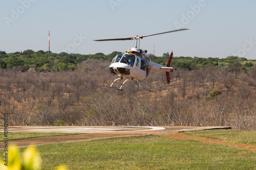 Helicopter landing at Victoria Falls