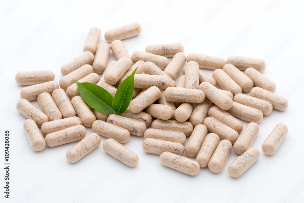 Ginkgo biloba capsule on the white background. Ginkgo biloba capsule on the white background.