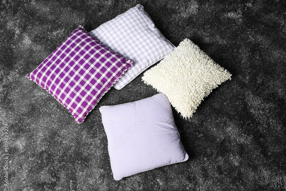 Decorative pillows on grey background Decorative pillows on grey background