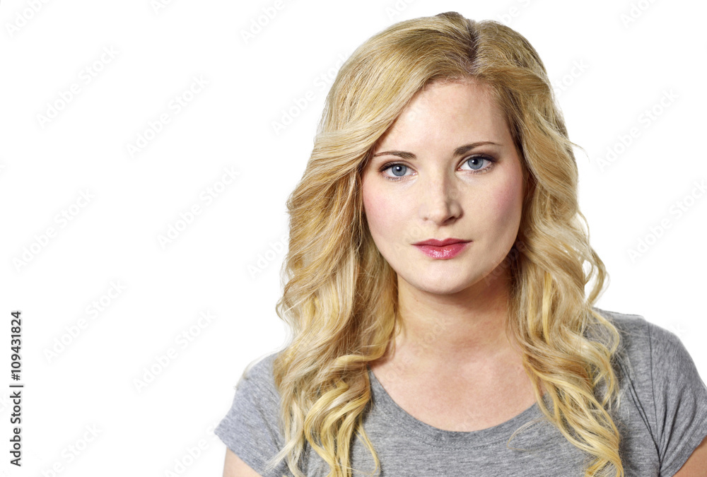 Beautiful blond woman looking to the camera. Positive Emotions. Young woman with copy space, isolated on white background. Beautiful blond woman looking to the camera. Positive Emotions. Young woman with copy space, isolated on white background.