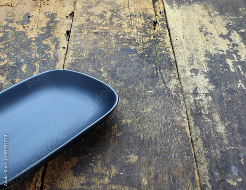 Empty dish plate on wooden background © studio2013