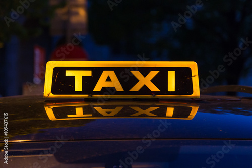 Typical Taxi Sign on a Car