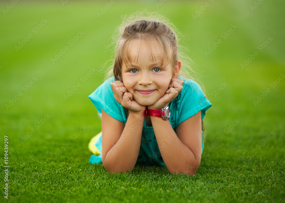 little funny girl on football stadium little funny girl on football stadium