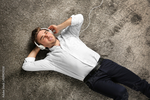 Young man with headphones l...