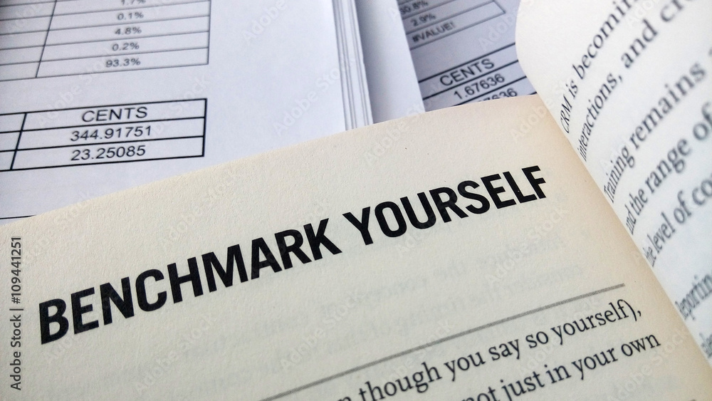 Obraz premium Benchmark yourself word on the book