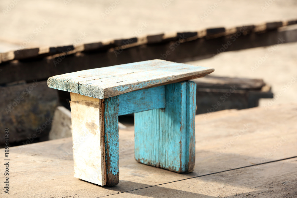 Small wooden stool.