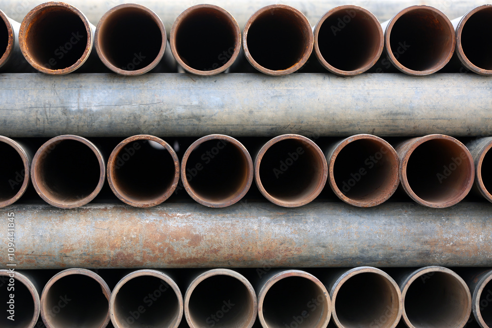 Metal pipes stacked background