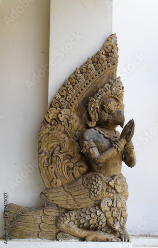 Traditional Thai style art at Wat Phra That Su Thon Mongkhon Khiri Samakkhi Tham, Phrae, Thailand photo