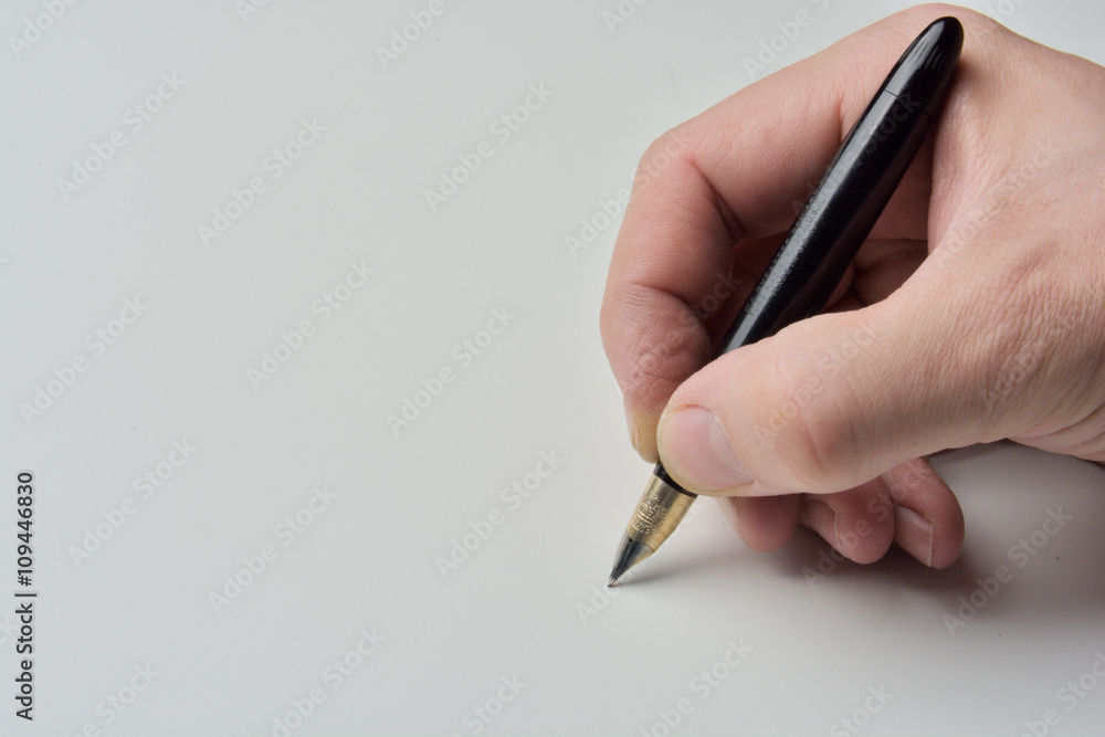 pen in the man's hand to signature pen in the man's hand to signature