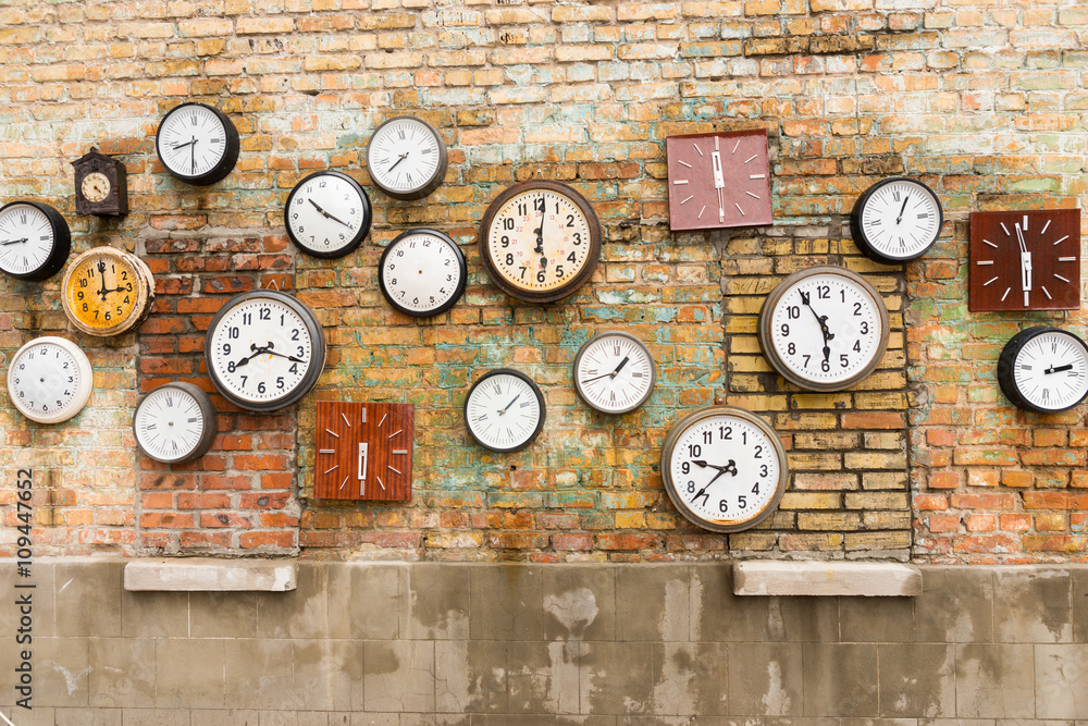 Abstract background composed of clocks on wall