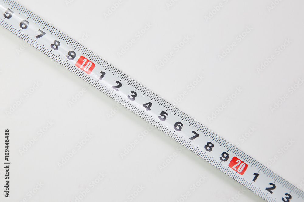 tape measure on white tape measure on white