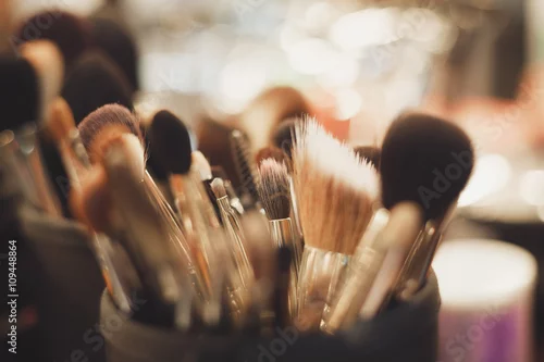 Obraz Professional visagiste brushes for make up.Set of brushes for facial makeup in beauty studio.Make up tools for professional visage on visagiste table in beauty salon