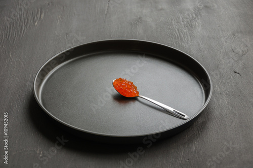 red caviar in spoon