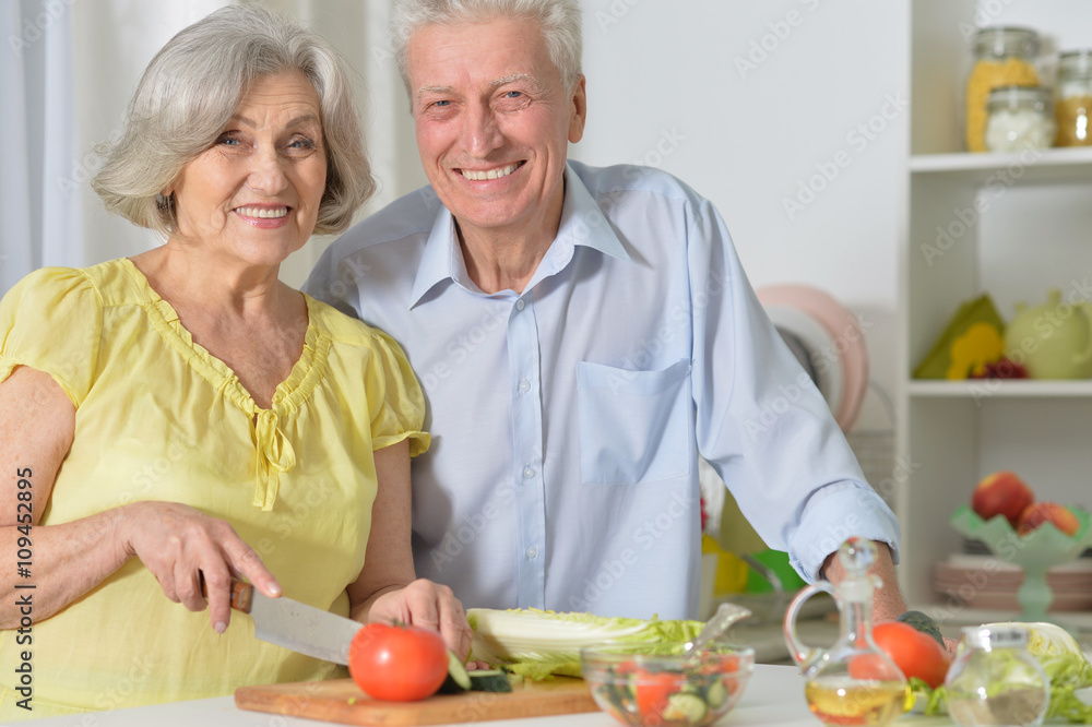 senior man and woman in the kitchen senior man and woman in the kitchen