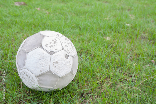 soccer ball on green grass © your123