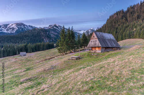 morning with wooden hut in Tatra mountains, Poland