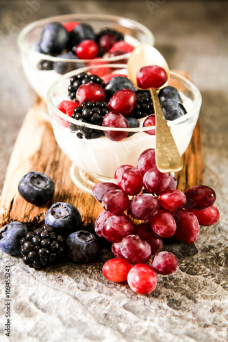 Serving of white Yogurt with Whole Fresh Blueberries