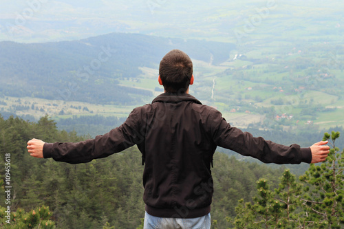 Freedom concept, Man enjoying mountain view