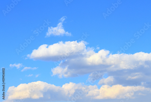 Blue  beautiful sky with  orange  grey  blue clouds