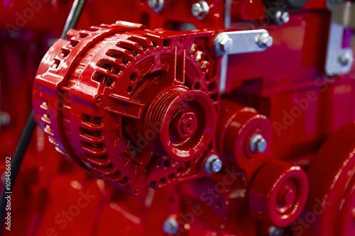 Detail of red powerful engine, diesel motor for oversize trucks, SUV, cargo, commercial and construction vehicles, heavy industry, selective focus 