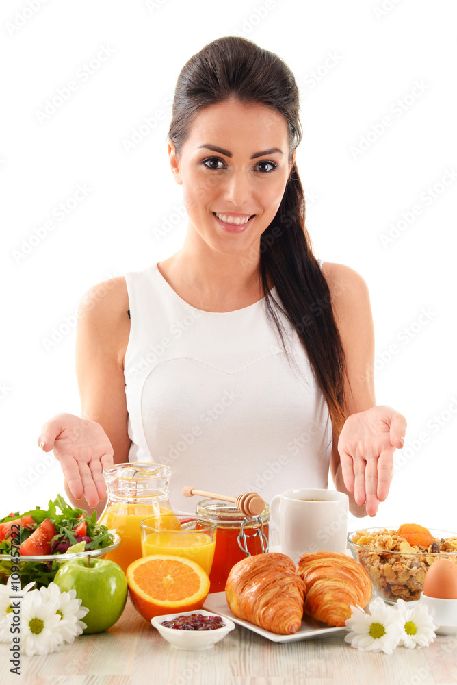 Young woman having breakfast. Balanced diet Young woman having breakfast. Balanced diet